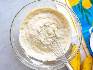 Step 2 Flour and baking powder folded into batter with spatula small lumps still visible.