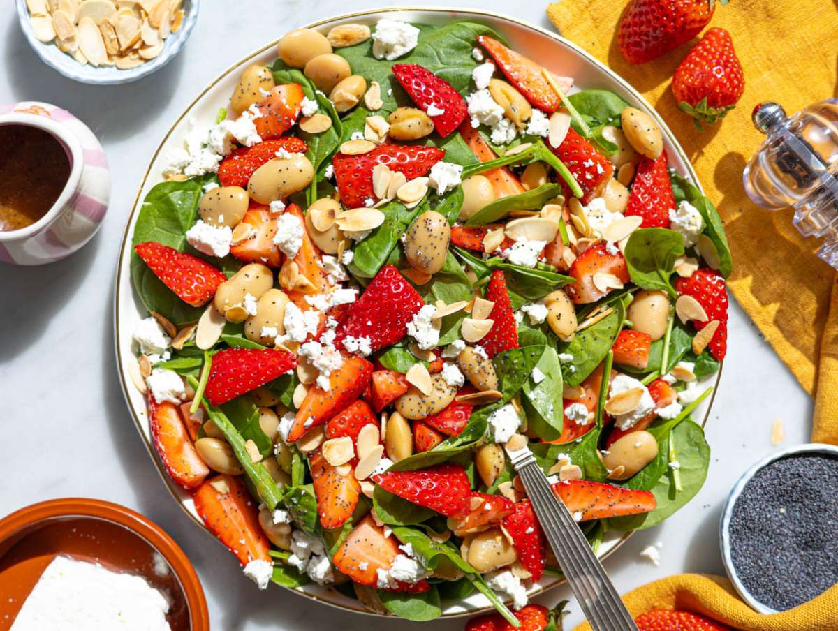 Step 3 Layering spinach beans and strawberries on platter with soft window light.
