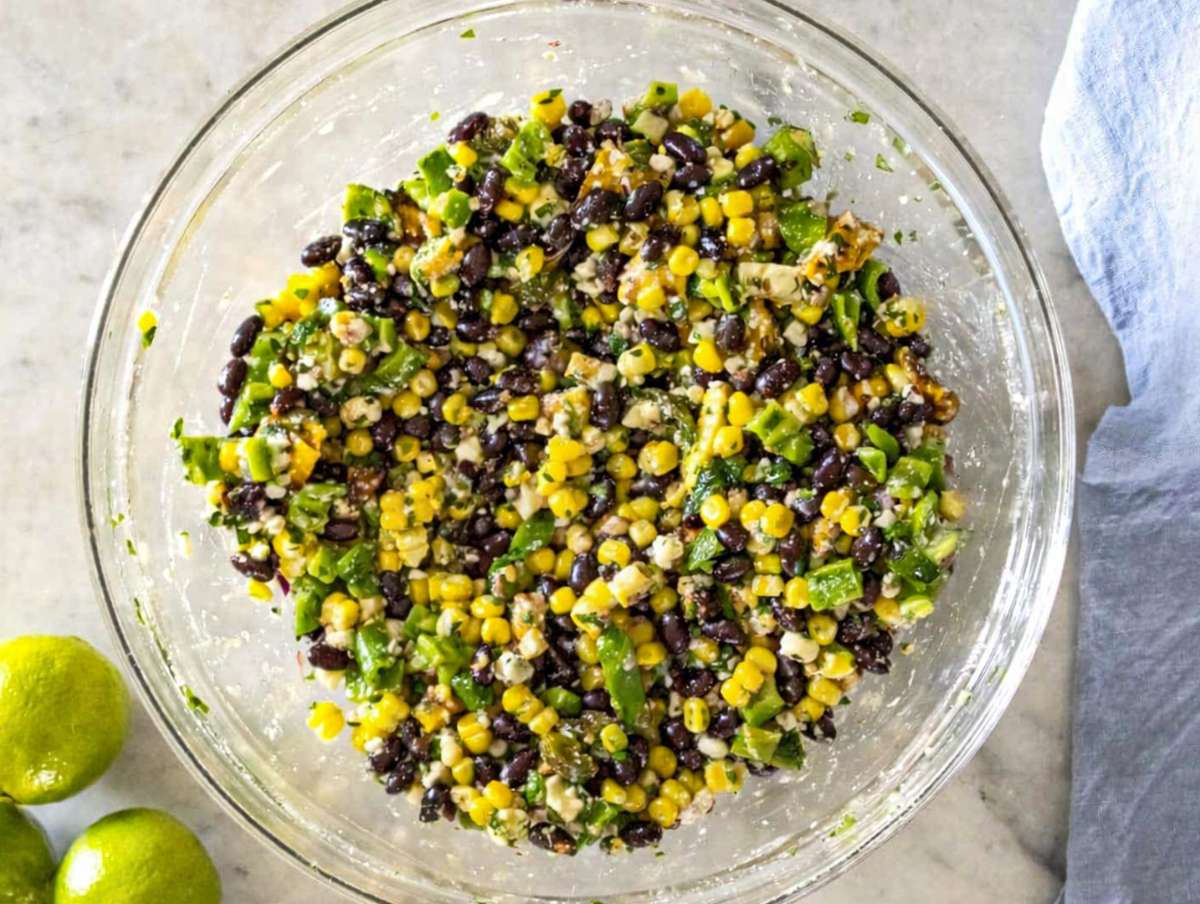 Step 3 Salad mixed with dressing in a bowl.