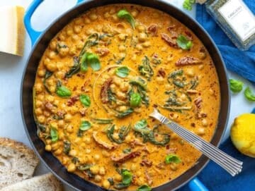 Step 4 Cool Greek yogurt melting into a warm parmesan and tomato chickpea sauce.