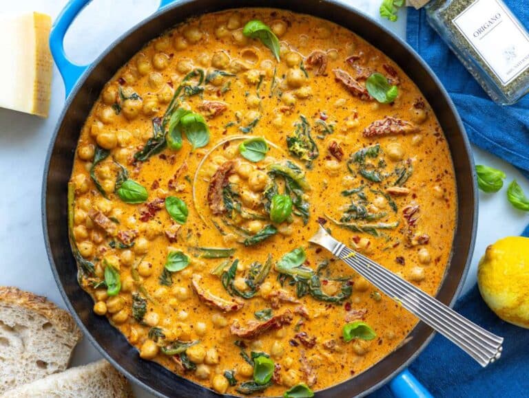 Step 4 Cool Greek yogurt melting into a warm parmesan and tomato chickpea sauce.