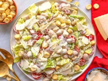 Step 4 Creamy butter bean caesar salad on a platter.