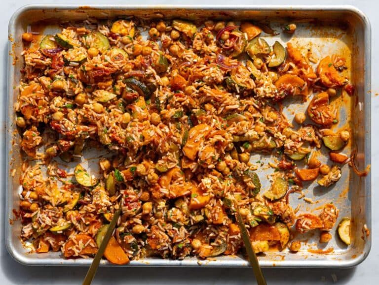 Step 4 Warm rice and feta tossed with roasted vegetables on sheet pan.