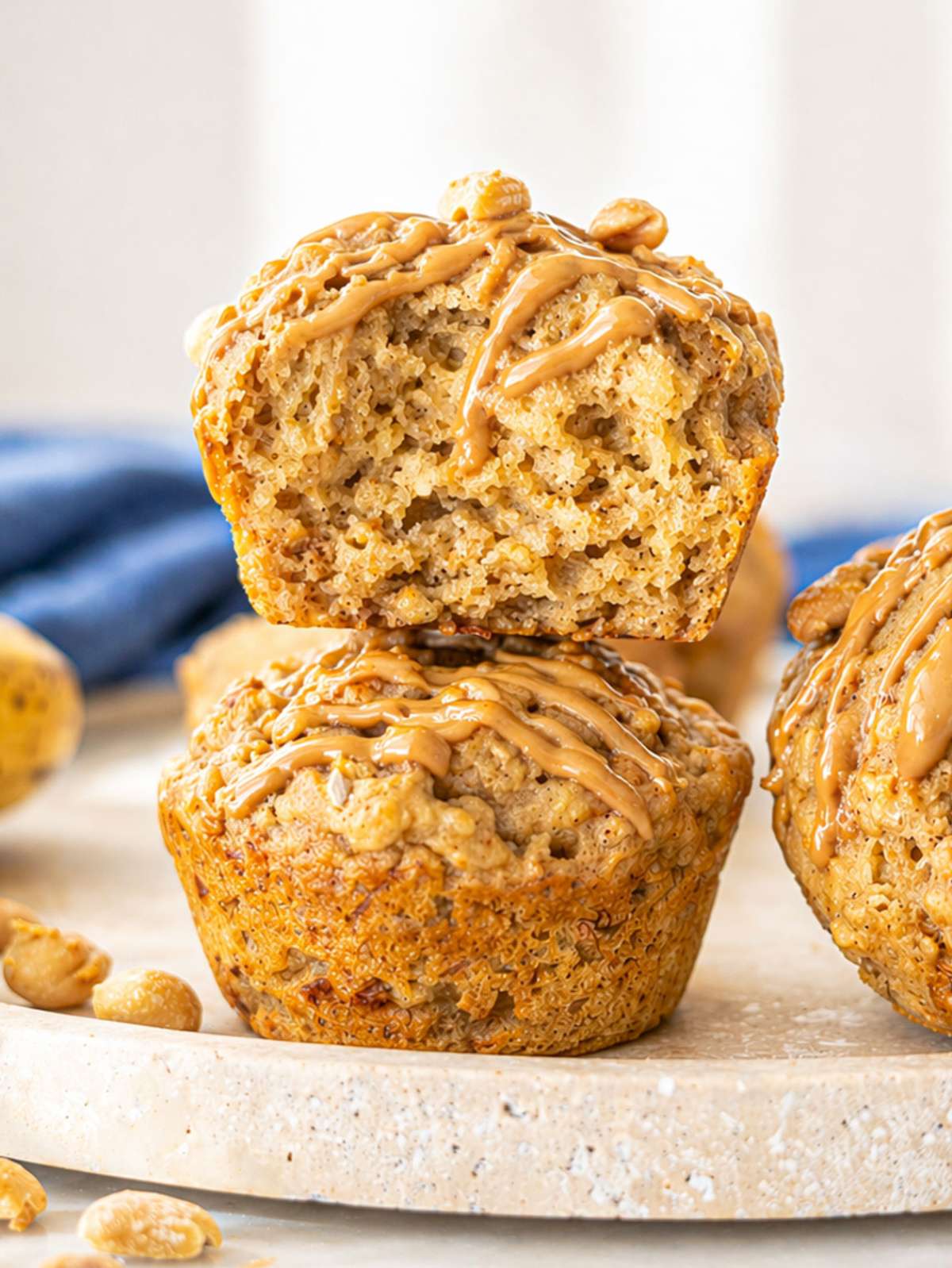 Close up of peanut butter banana muffins showing moist interior and oats texture.