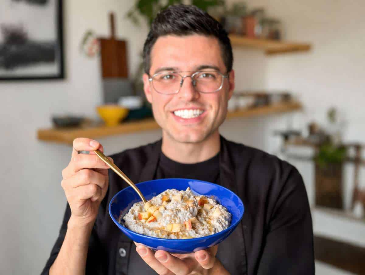 Nico with a chia pudding in a kitchen.