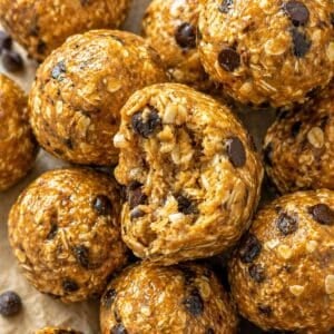 No-bake peanut butter energy balls served chilled on a marble table.