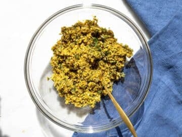 Step 1 Chickpeas, herbs, onion, and garlic pulsed into coarse falafel mixture.