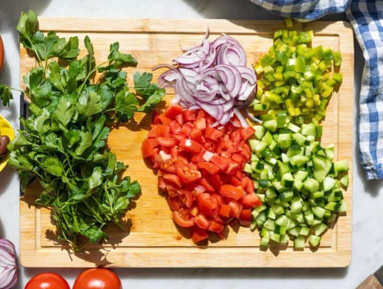 Step 1 Chopping vegetables on cutting board.