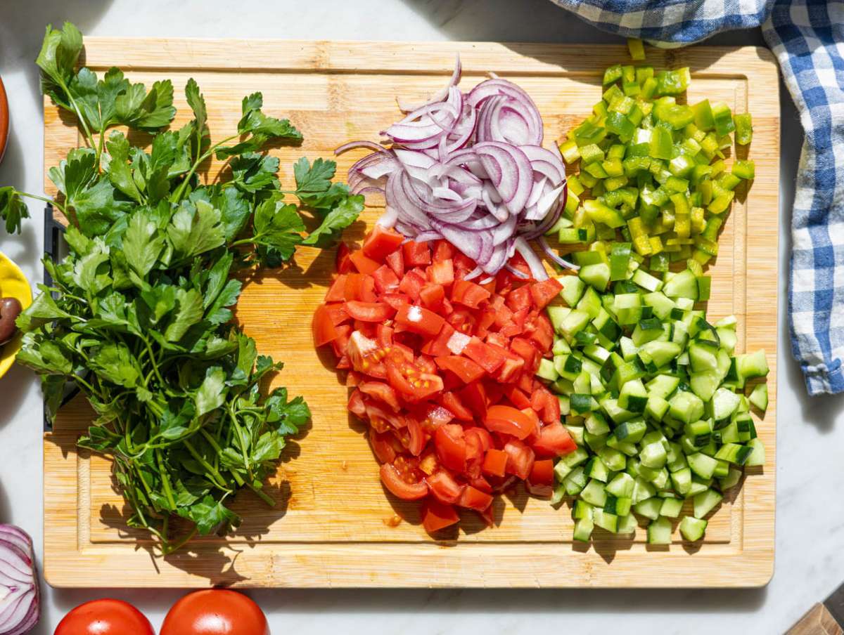 Step 1 Chopping vegetables on cutting board.