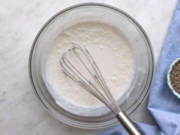 Step 1 whisking coconut milk, Greek yogurt, honey, and vanilla in a bowl.