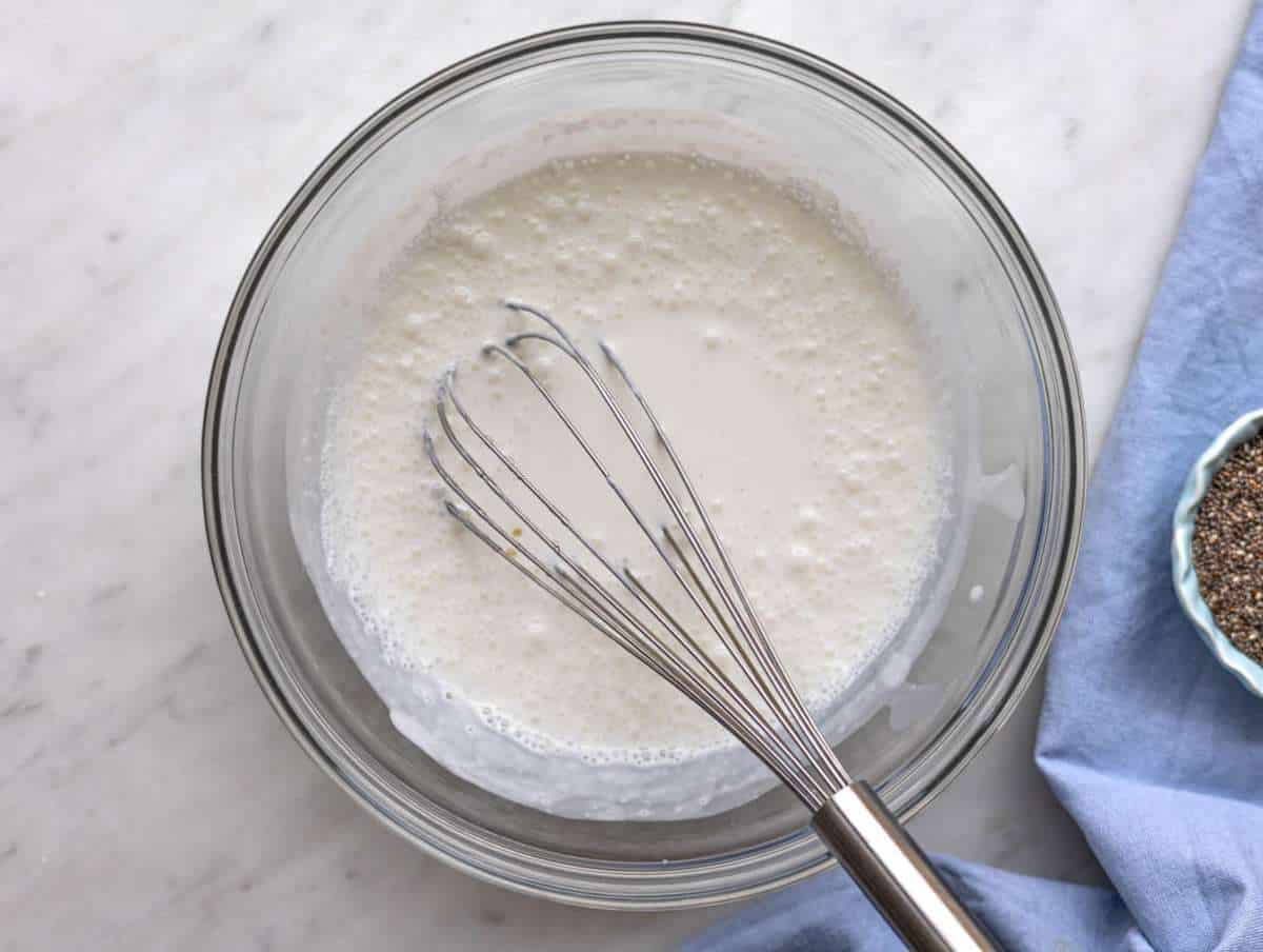 Step 1 whisking coconut milk, Greek yogurt, honey, and vanilla in a bowl.