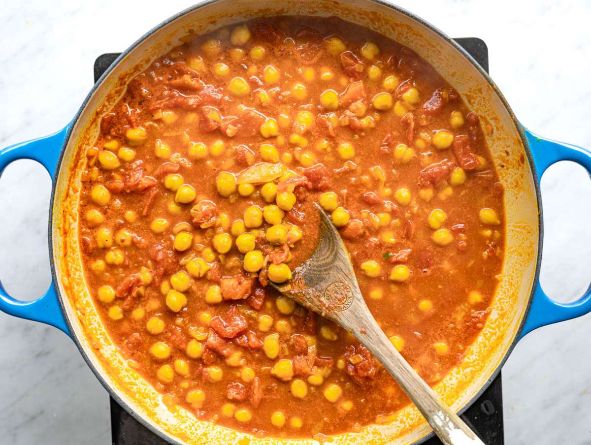 Step 2 Chickpeas, tomatoes, and stock simmering into thick curry.