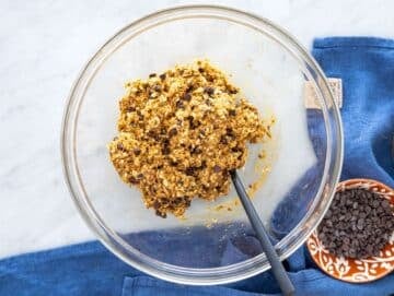 Step 2 Oats, seeds, chocolate chips, cinnamon, and salt added to peanut butter mixture.