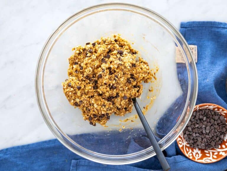 Step 2 Oats, seeds, chocolate chips, cinnamon, and salt added to peanut butter mixture.