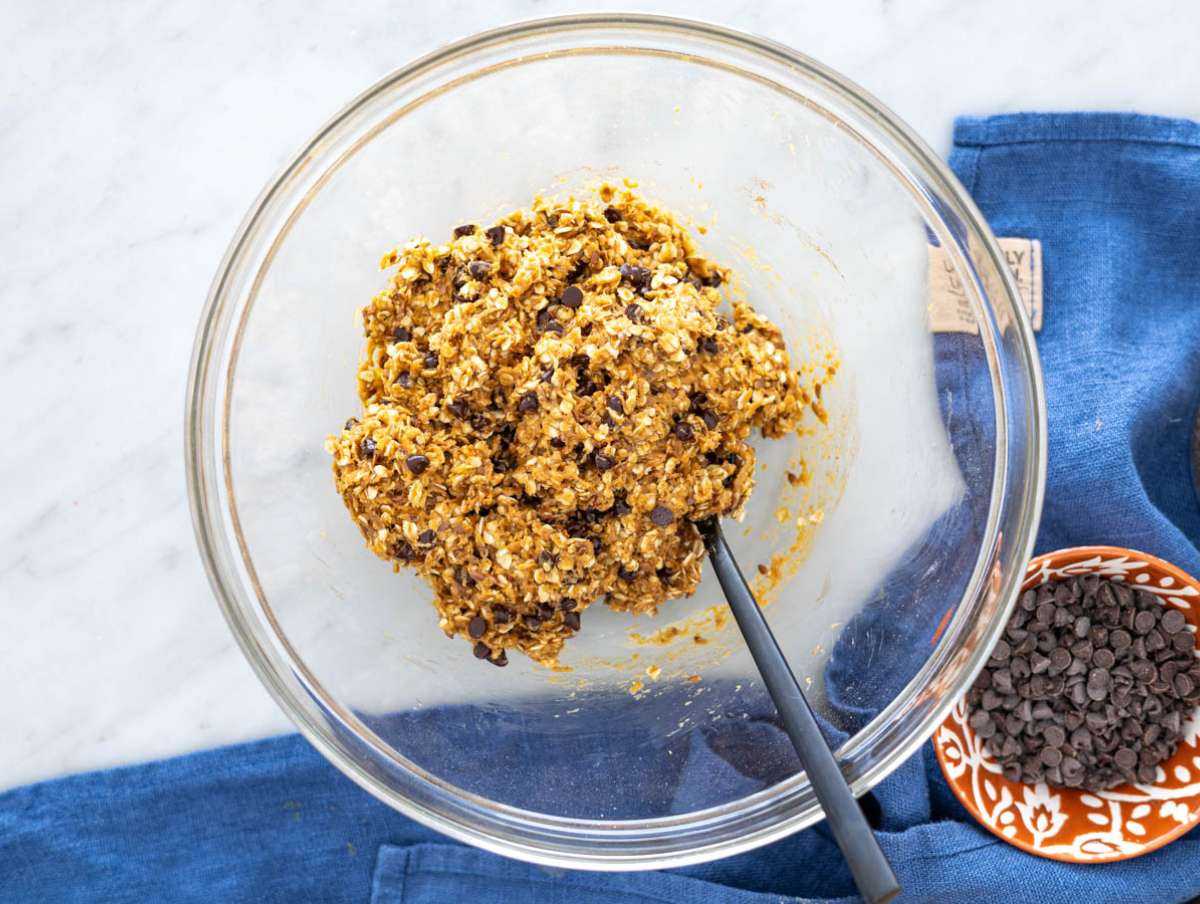 Step 2 Oats, seeds, chocolate chips, cinnamon, and salt added to peanut butter mixture.