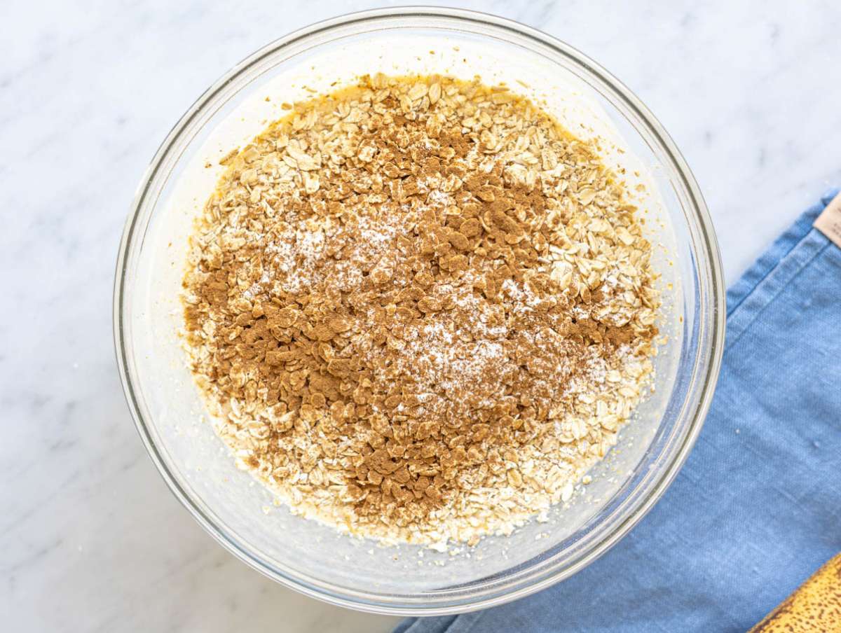 Step 2 rolled oats and cinnamon added to the wet ingredients.