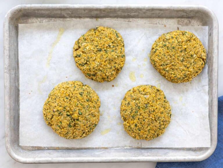 Step 3 Baked falafel patties on lined baking tray.