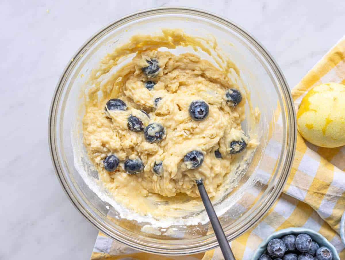 Step 3 Batter mixed in a bowl with blueberries folded in.