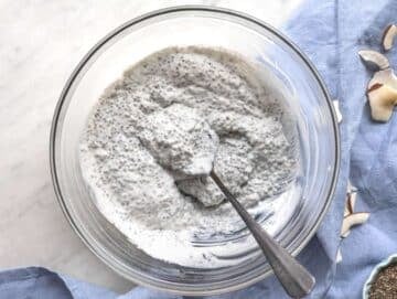 Step 3 Stirring thick coconut chia pudding in bowl before serving.