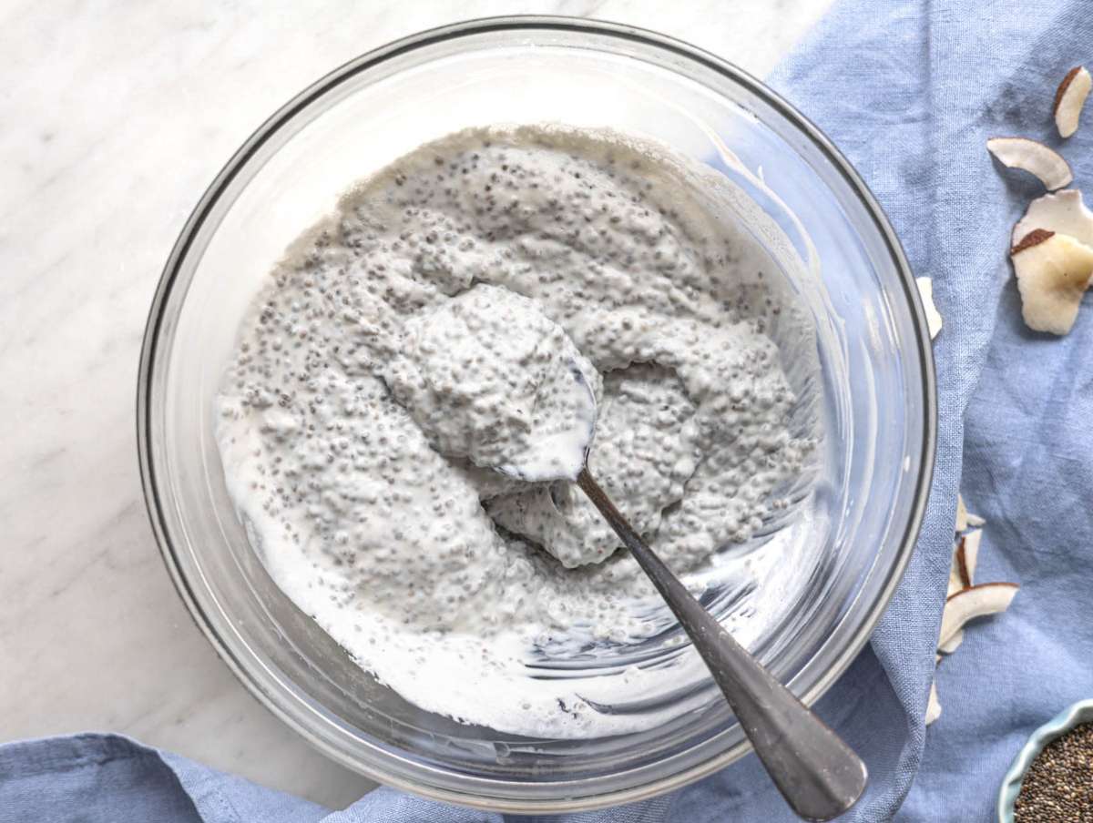 Step 3 Stirring thick coconut chia pudding in bowl before serving.