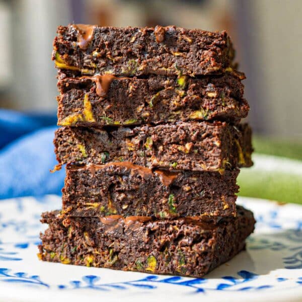 Close-up of fudgy zucchini brownie showing rich chocolate texture.