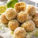 Key lime pie energy balls rolled in coconut and lime zest.