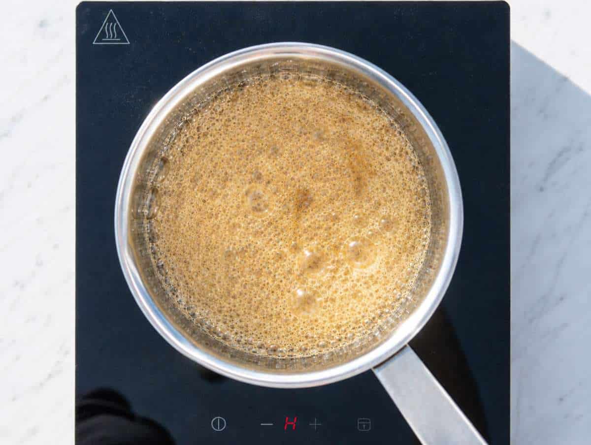 Step 1 Maple syrup and butter melting together in a saucepan.
