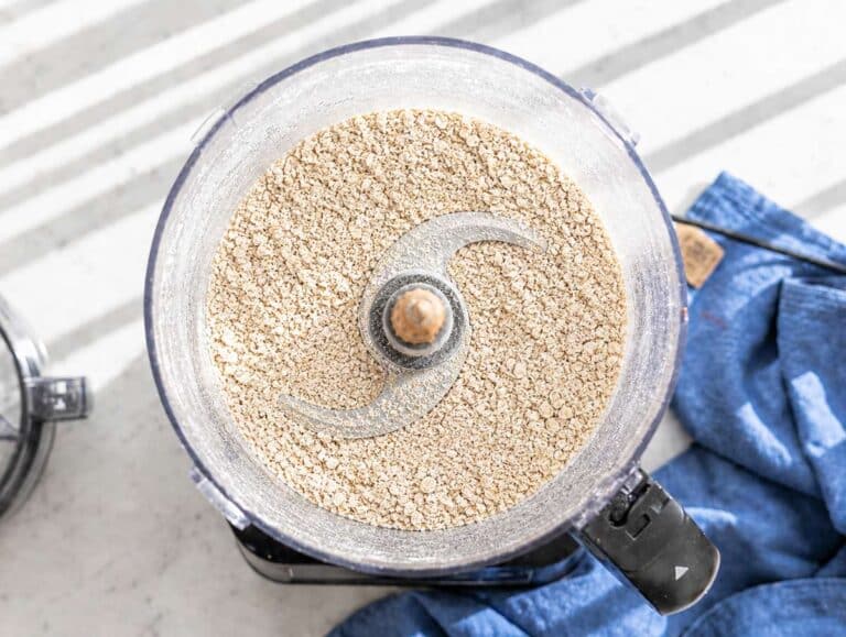 Step 1 Rolled oats blending in food processor into coarse flour texture.