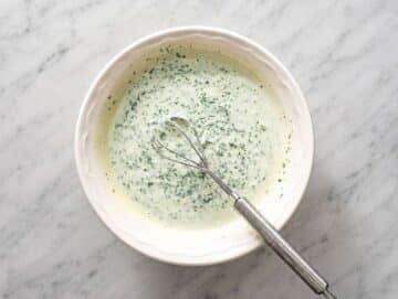 Step 2 Creamy cilantro lime dressing whisked in a small bowl.