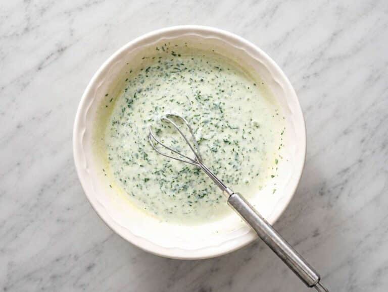 Step 2 Creamy cilantro lime dressing whisked in a small bowl.