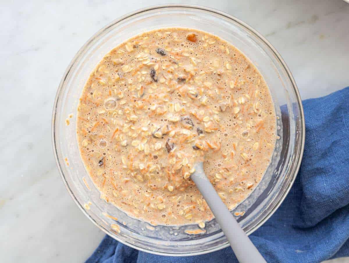 Step 2 Grated carrots and oats mixed into creamy batter with spices.