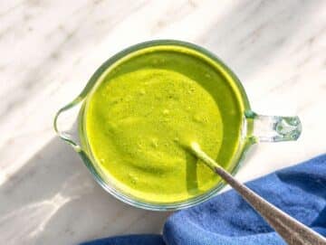 Step 2 Greek yogurt and herbs blended into smooth green dressing in jar.
