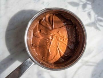 Step 2 Peanut butter stirred into warm chocolate mixture until glossy and creamy.