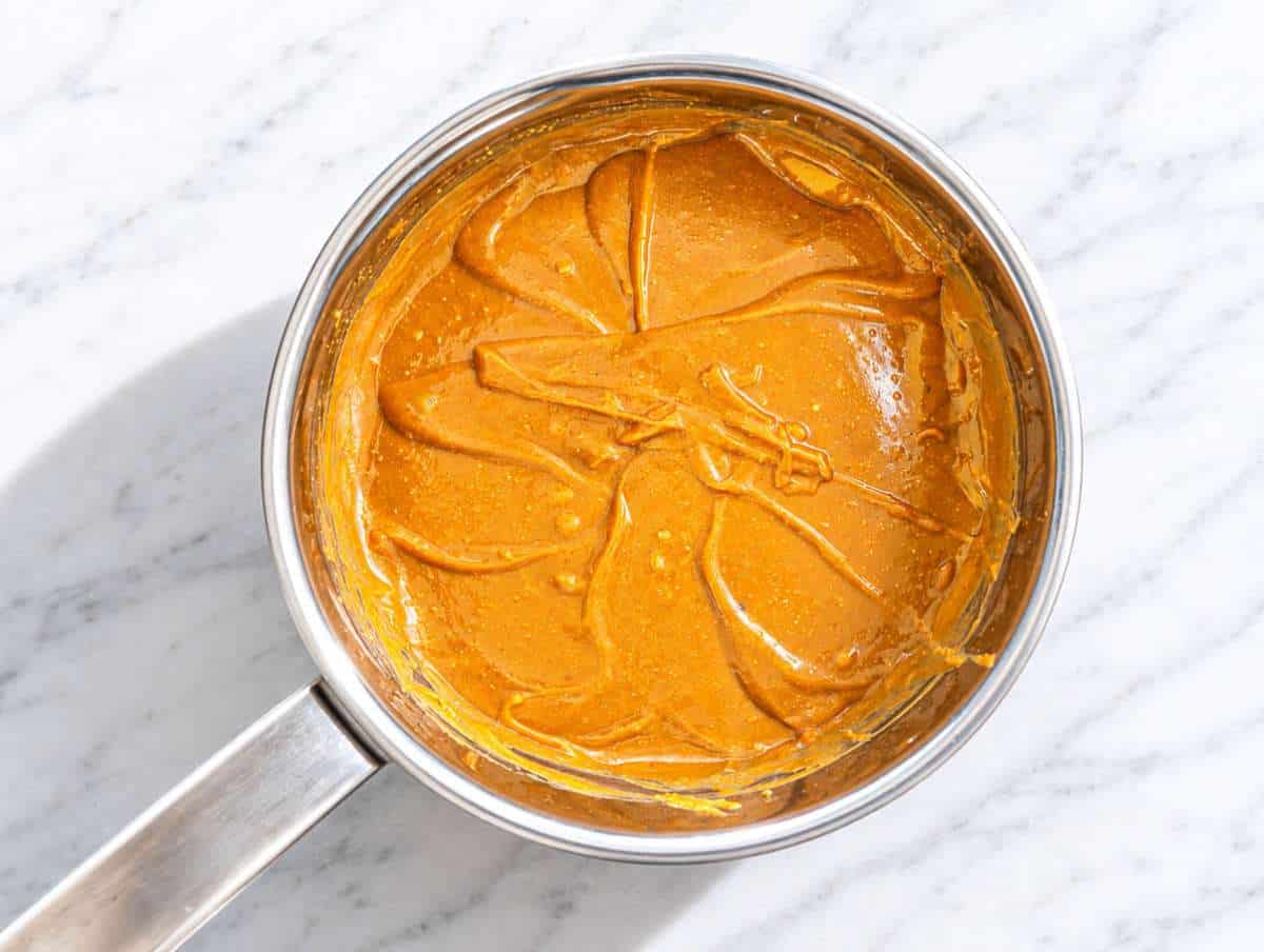 Step 2 Peanut butter stirred into warm maple syrup mixture until smooth.