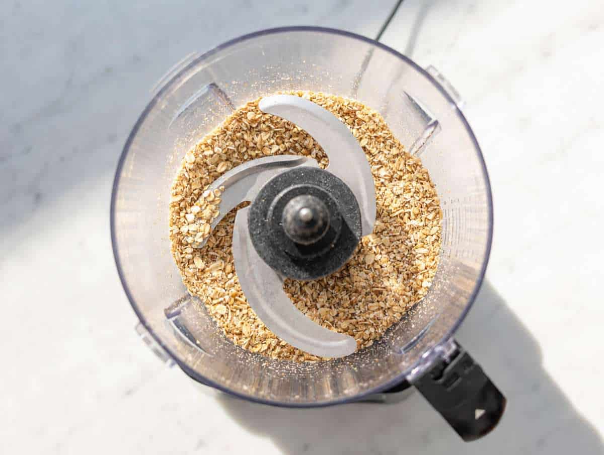 Step 2 Rolled oats and walnuts blended into crumbly mixture in food processor.