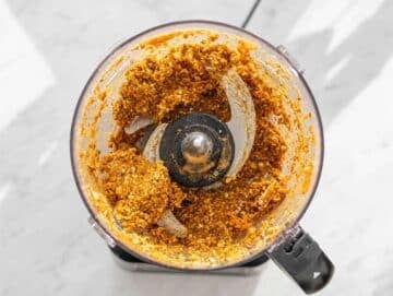 Step 3 Dates, raisins, oats, walnuts, and spices blended into sticky carrot cake mixture.