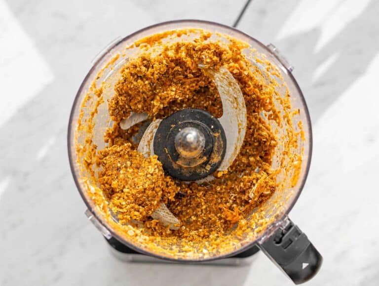 Step 3 Dates, raisins, oats, walnuts, and spices blended into sticky carrot cake mixture.