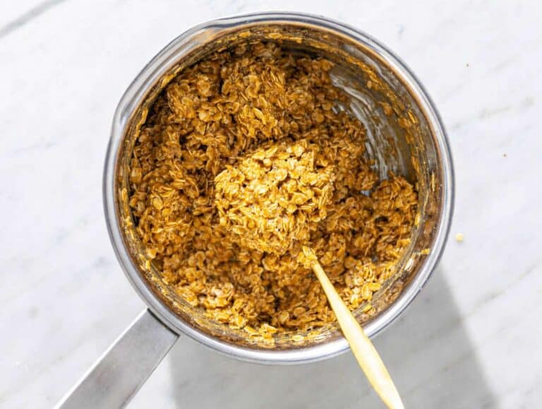 Step 3 Rolled oats mixed into peanut butter mixture in a saucepan.