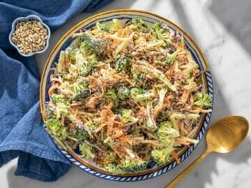 Step 3 Tossed broccoli slaw resting before serving on a platter.