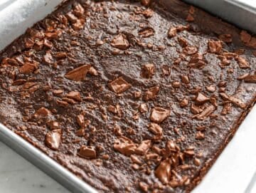 Step 4 Baked date brownies cooling in baking pan before cutting.