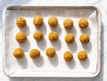 Step 4 Carrot cake balls on a tray ready to be chilled.