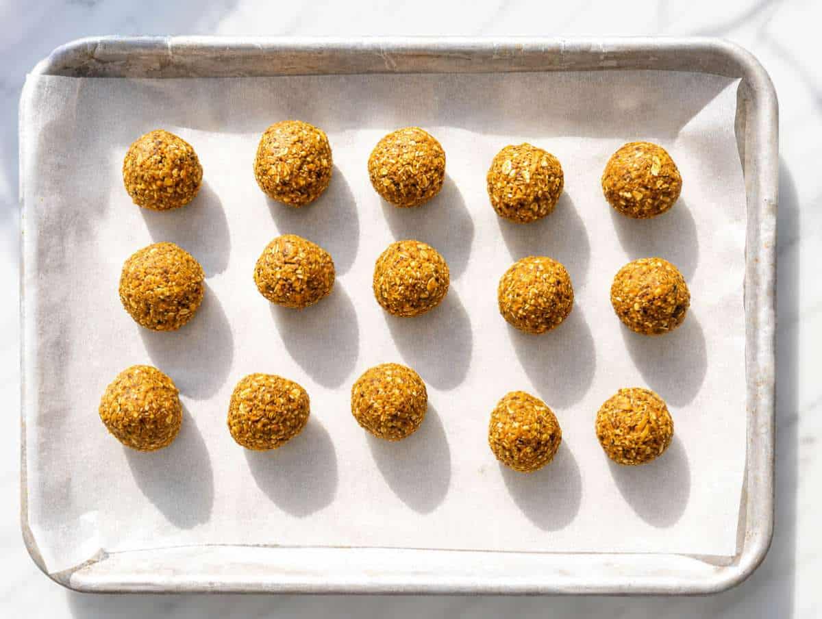 Step 4 Carrot cake balls on a tray ready to be chilled.