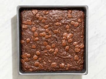 Step 5 Healthy zucchini brownies cooling in a baking pan.