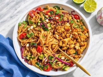 Step 5 Spring roll bowl topped with crispy tofu, cilantro and peanuts.