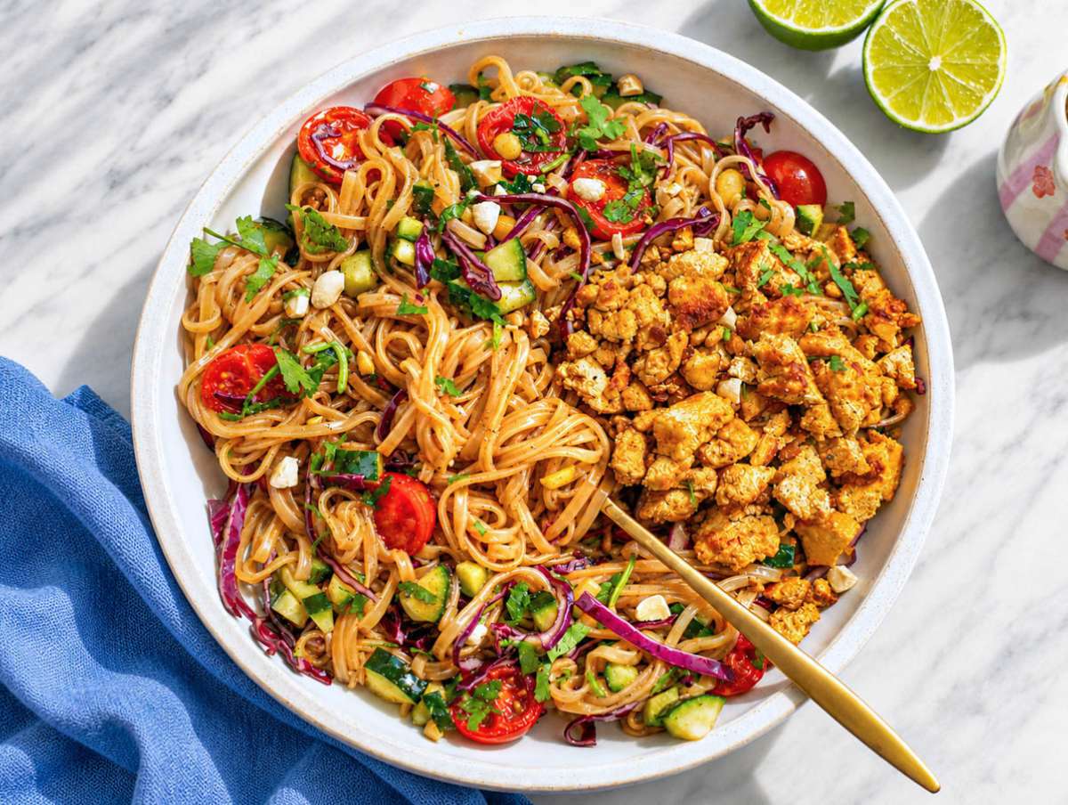 Step 5 Spring roll bowl topped with crispy tofu, cilantro and peanuts.