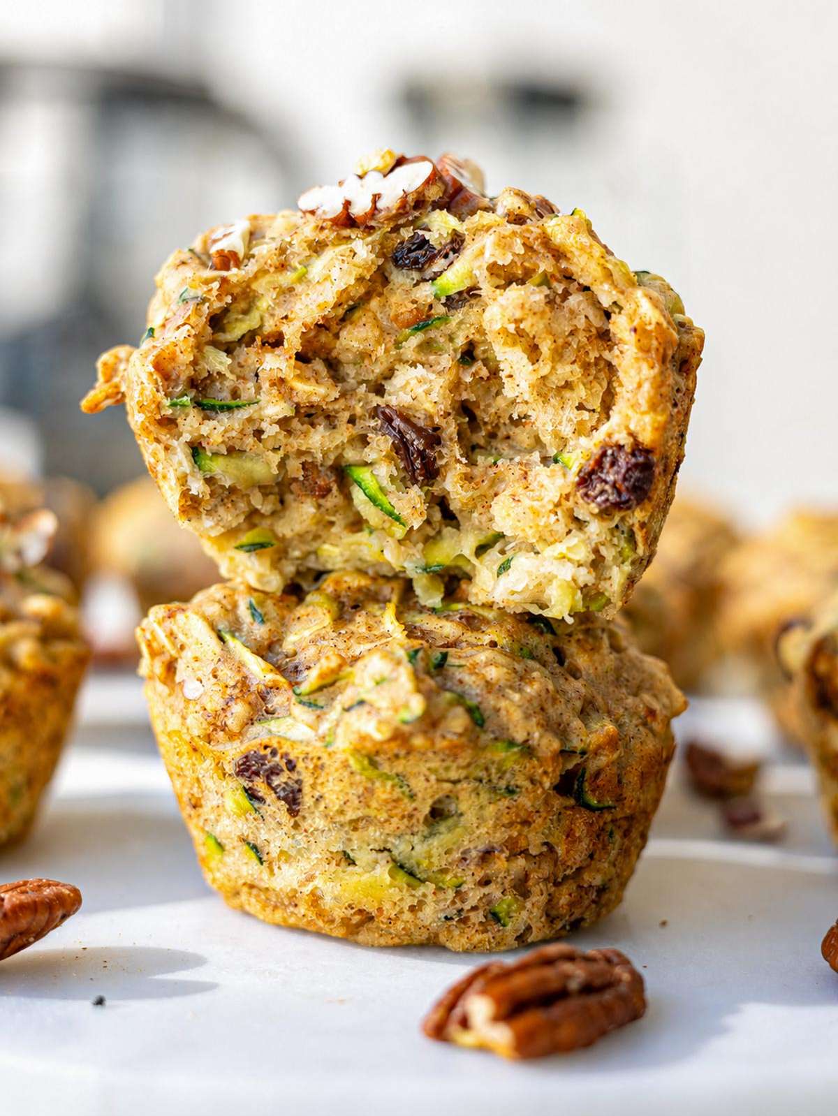 Close-up of moist zucchini muffin crumb.