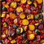 Golden Greek roasted vegetables in a sheet pan briam style.