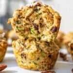 Healthy zucchini muffins with walnuts and raisins.