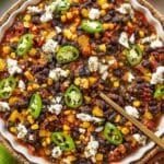 No cook chili served with feta and cilantro and a spoon.