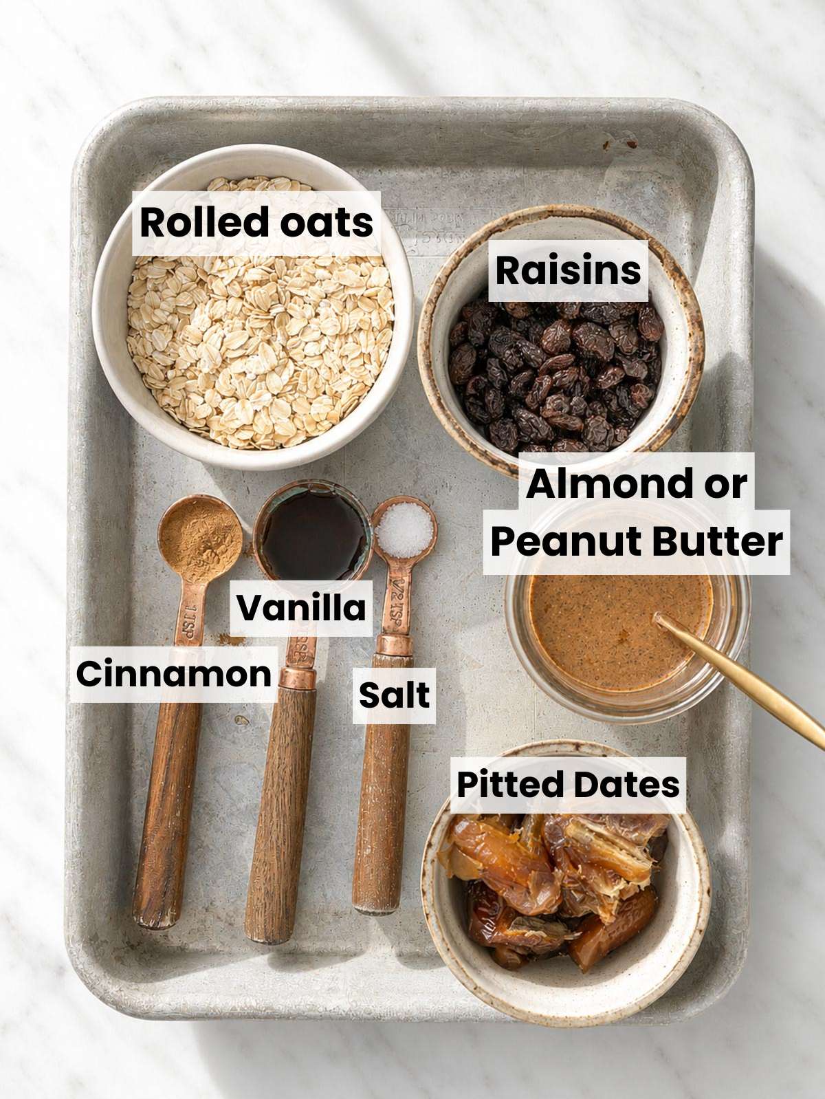 Rolled oats, dates, raisins, and almond butter.